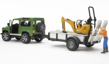 Auto LAND ROVER DEFENDER zelené s návěsem, minibagrem JCB a figurkou BRUDER WORLD