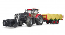 Traktor CASE IH OPTUM 300 CVX s čelním nakladačem a návěsem na balíky